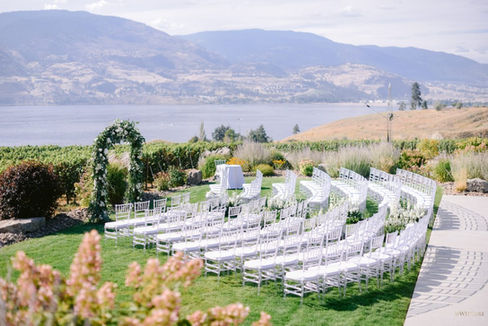 Stephanie and Donald's wedding was an experience of elegance in an elevated winery setting, infused with a charming backyard Hampton's feel.
Set in the breathtaking British Columbia landscape, their enchanting celebration featured lush greenery and delicate white florals that beautifully complemented a serene grey and soft blue colour palette. Every detail reflected a harmonious blend of sophistication and beauty, creating an unforgettable atmosphere for their special day. The scenic surroundings and tasteful decor set the stage for a truly memorable celebration.