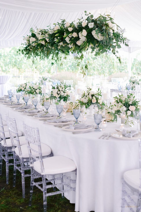 Stephanie and Donald's wedding was an experience of elegance in an elevated winery setting, infused with a charming backyard Hampton's feel.
Set in the breathtaking British Columbia landscape, their enchanting celebration featured lush greenery and delicate white florals that beautifully complemented a serene grey and soft blue colour palette. Every detail reflected a harmonious blend of sophistication and beauty, creating an unforgettable atmosphere for their special day. The scenic surroundings and tasteful decor set the stage for a truly memorable celebration.