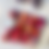 Thumbnail: skeins of merino yarns in red pink and yellow