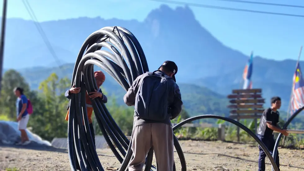 villagers executing gravity water project together