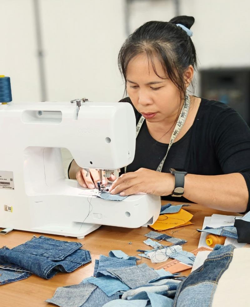 rural woman sewing craft
