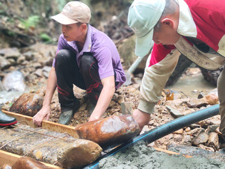 rural villagers building water catchment