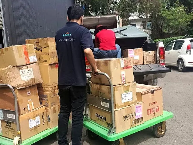 Collecting expired food waste from local stores for repurposing.