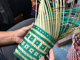 A half-finished handcrafted bamboo wine holder