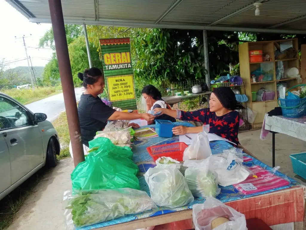 rural women selling products to customer