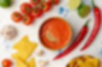 Mexican nacho chips and salsa dip in bow
