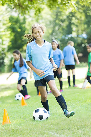 kiddie playing football.jpg