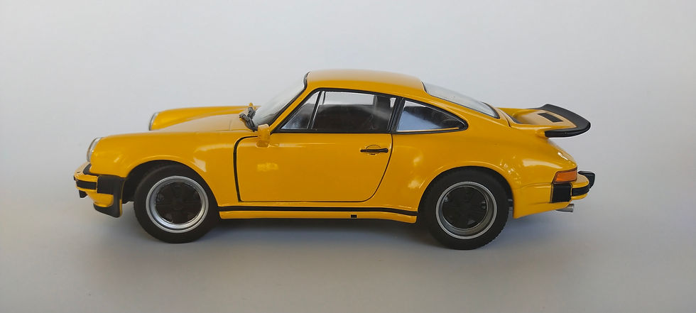 Miniatura: Porsche 911 Turbo (Welly) Amarillo 1/24