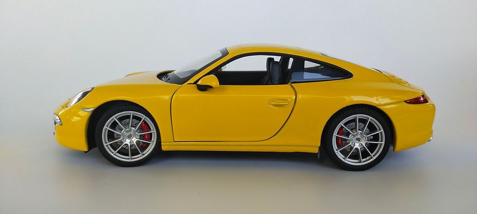 Miniatura: Porsche 911 (991) Carrera S (Welly) Amarillo 1/24