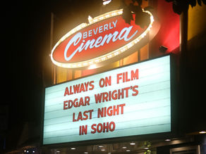A nighttime view of a cinema marquee for Edgar Wright's "Last Night in Soho" at the Beverly Cinema. Transcribed Text: BEVERLY Cinema ALWAYS ON FILM EDGAR WRIGHT'S LAST NIGHT IN SOHO