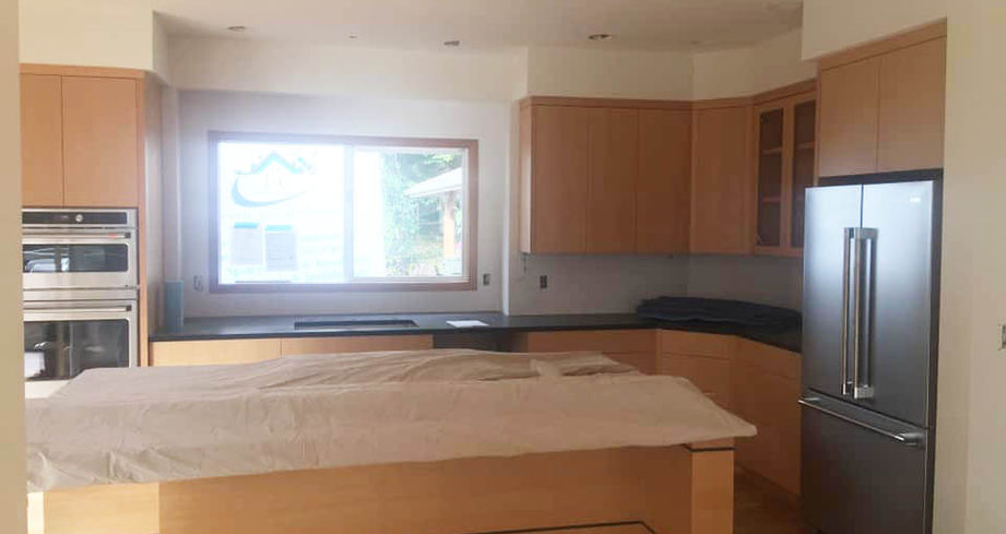 Kitchen cabinet and millwork painting in Everett, WA by J&C Quality Services.