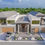 Thumbnail: Luxury 11-bedroom double-story house with pitched roofs, balconies, courtyard, long pool, stone entrance, large windows, and