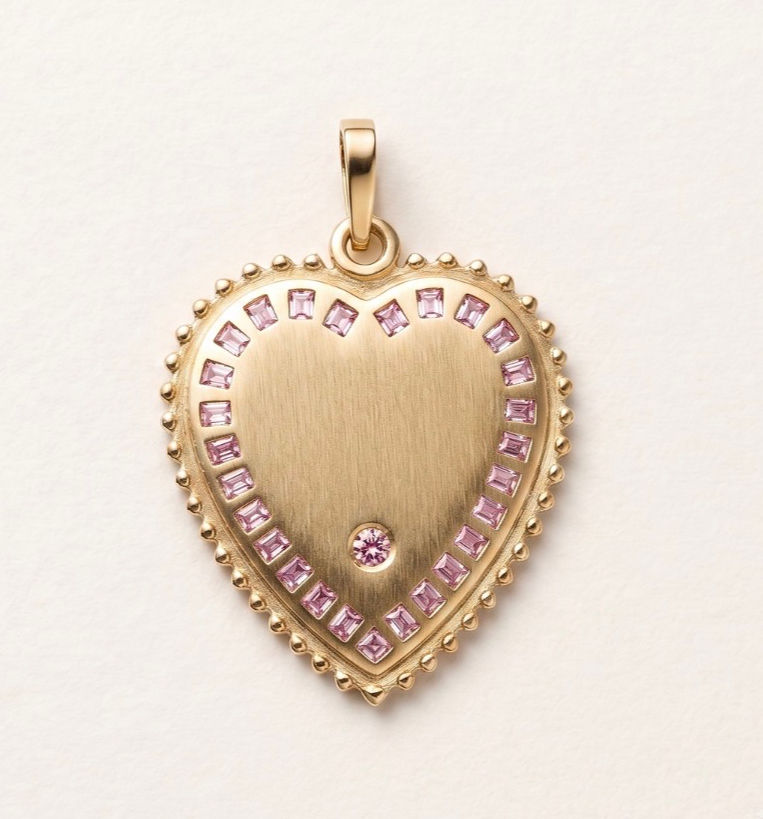 Back of an 18k gold heart pendant inspired by French Love Medallions by Evermine.