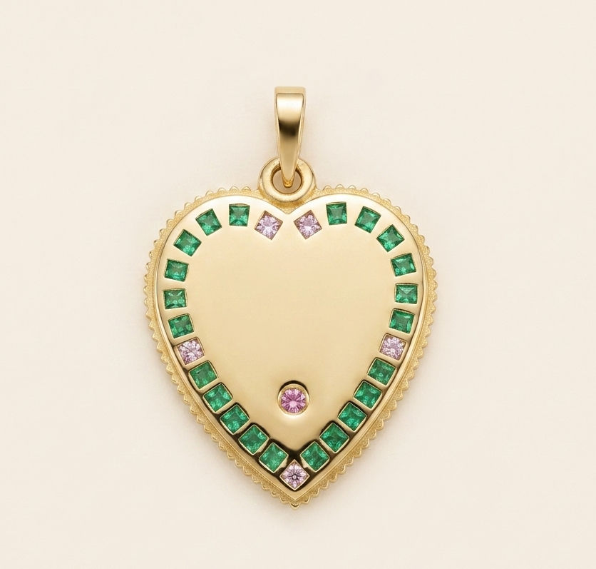 Back of an 18k gold emerald heart pendant inspired by french love medallion handcrafted in France by Evermine.