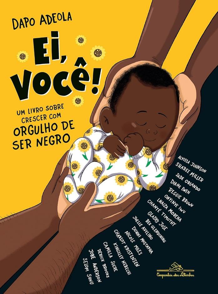 Capa do livro. Num dundo amarelo, um bebê negro apresenta tranquilidade ao ser amparado por 4 mãos. 