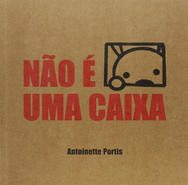 Capa do livro feita de papel no tom de papelão. Nela, numa pequena janela, um animal observa o leitor.