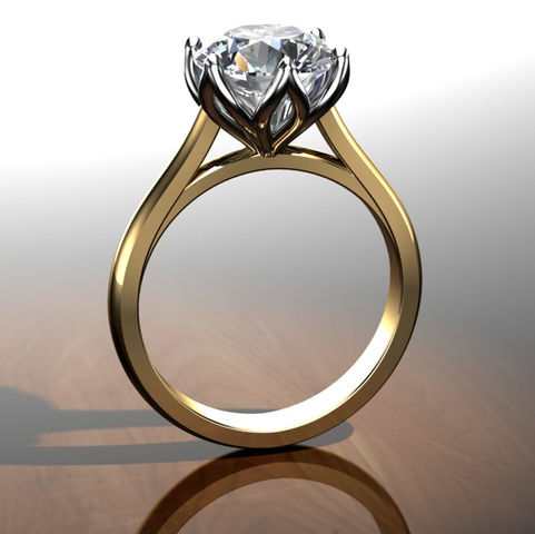 Bespoke 18ct yellow and wight gold solitaire made by Chris Simpson designs in our Dorset jewellery workshop.
