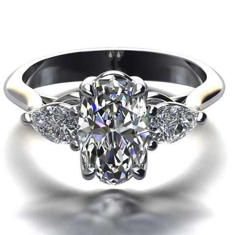 Oval and Pear diamond trilogy set in 18ct white gold. Made by Chris Simpson designs right here in Wimborne.