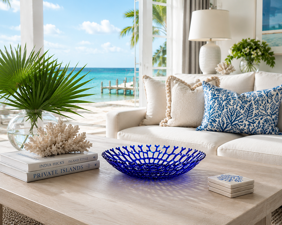 Cobalt blue glass coral bowl styled in elegant coastal living room with ocean-inspired luxury home decor