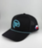 Custom embroidery on black Team Inc hat with Texas flag