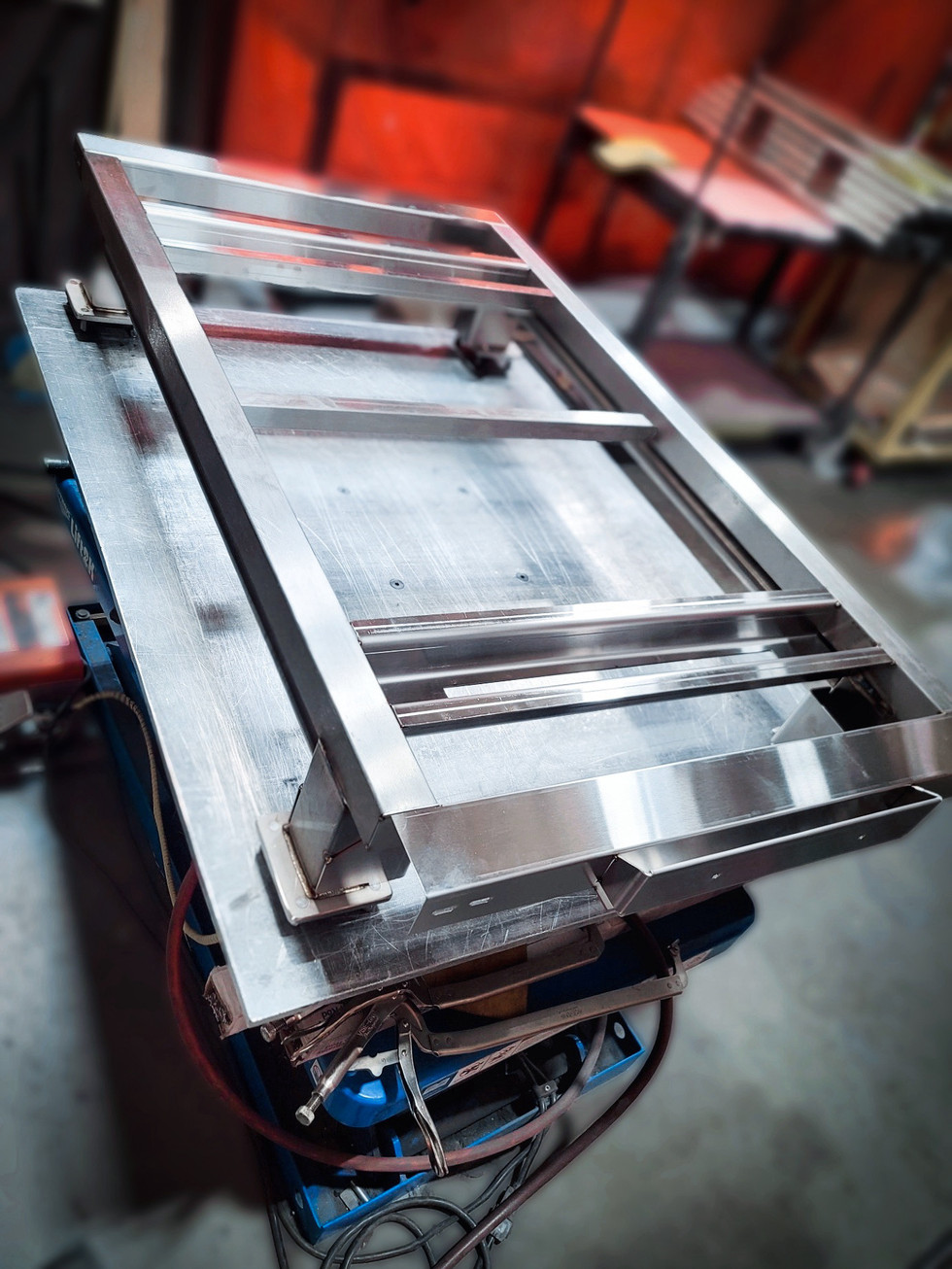 Stainless steel chassis with exposed welds and rigid frame geometry, designed for structural support in industrial or custom-built applications.
