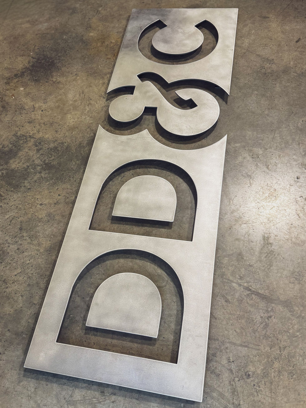 Large 1/4 inch Corten steel custom business logo sign precision cut for commercial installation