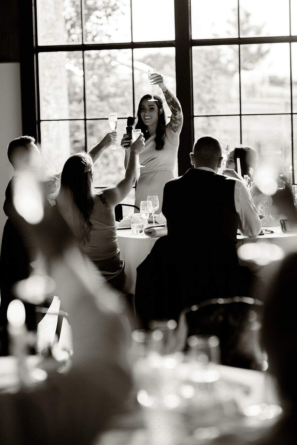 Bridesmaid raises a toast