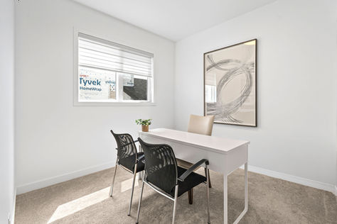 Main-floor bedroom or office space at 93 Mill Rock Road.