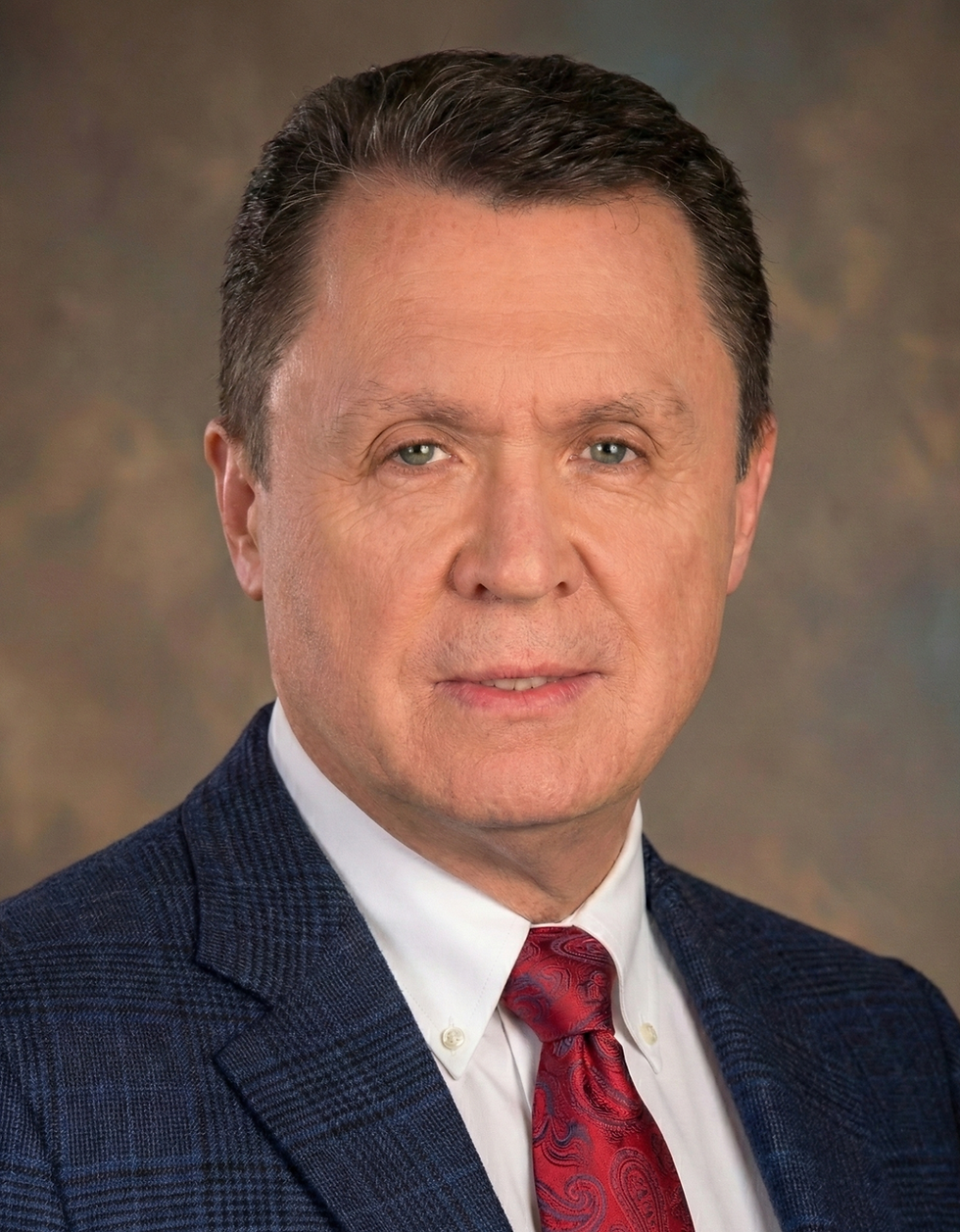 Dr. Volodymyr Semynozhenko