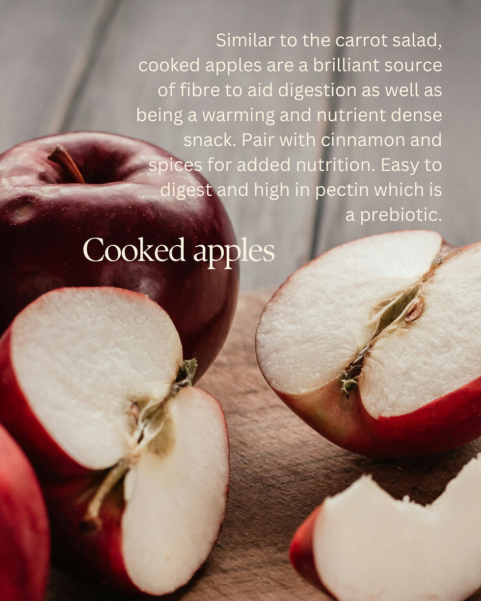Red apples sliced on a wooden board with text about their digestive benefits and nutrient content in the background.