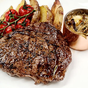 8OZ DRY AGED RIBEYE STEAK, FRIED EGGS & FRIES
