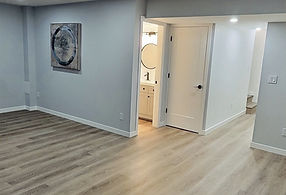 This unfinished basement was turned from dark, to light and modern with extra lighting and modern finishes.