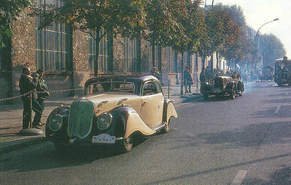 This photo captures the Panhard & Levassor Dynamic during a historic centennial parade in Paris, France, on Saturday, October 26, 1991.