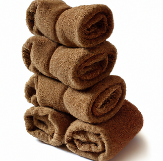DALL·E 2023-01-24 18.12.13 - 6 brown rags on top of each other .png