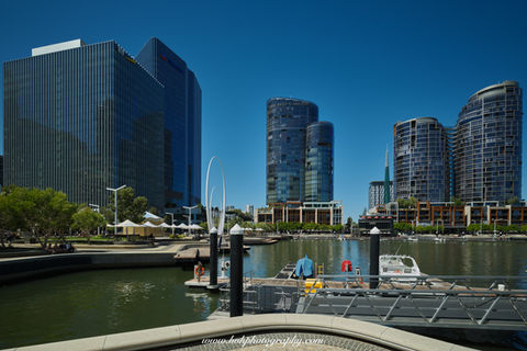 Elizabeth Quay Perth, Swan River waterfront, Perth city skyline, modern architecture WA, luxury boats marina, waterfront reflections, urban landscape photography, Perth sunrise light, Western Australia travel, city waterfront scenes