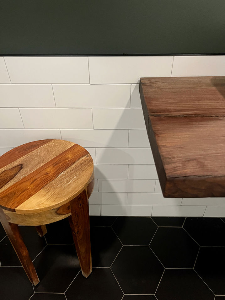 Dark Green and Wood and White Tile Bathroom