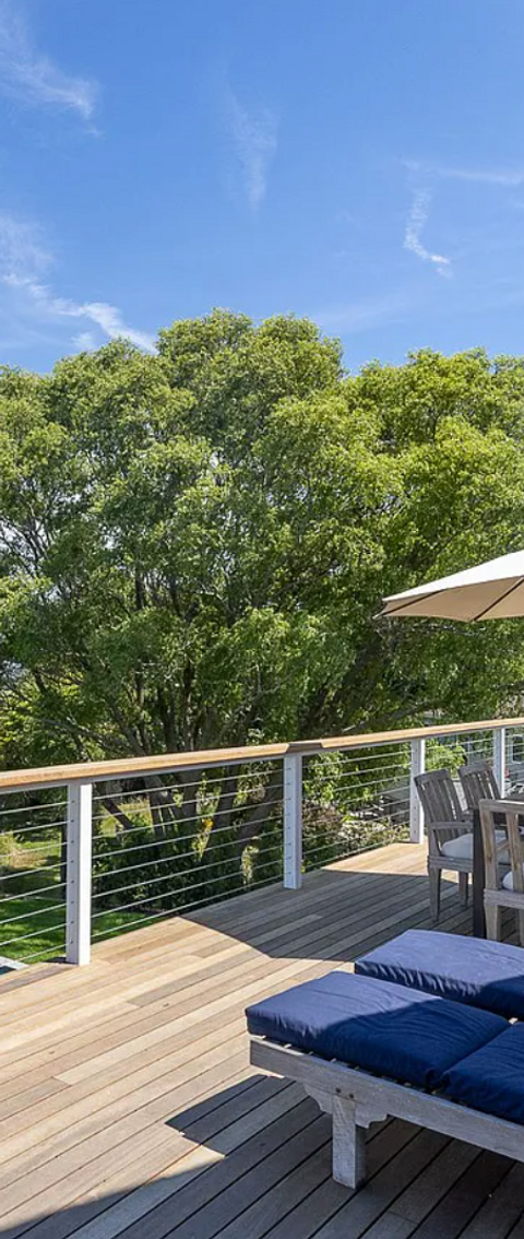 High End Construction Montauk Hamptons New York Luxury Home Design Builder Preppy Pool Deck Umbrella