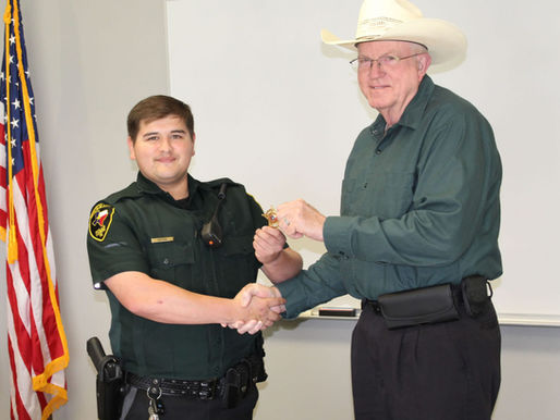 Sheriff David Warren swears in new Deputy