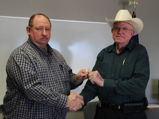 Sheriff David Warren swears in new Deputy