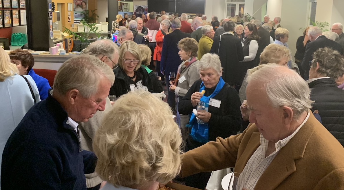 Members enjpyoing the supper!
