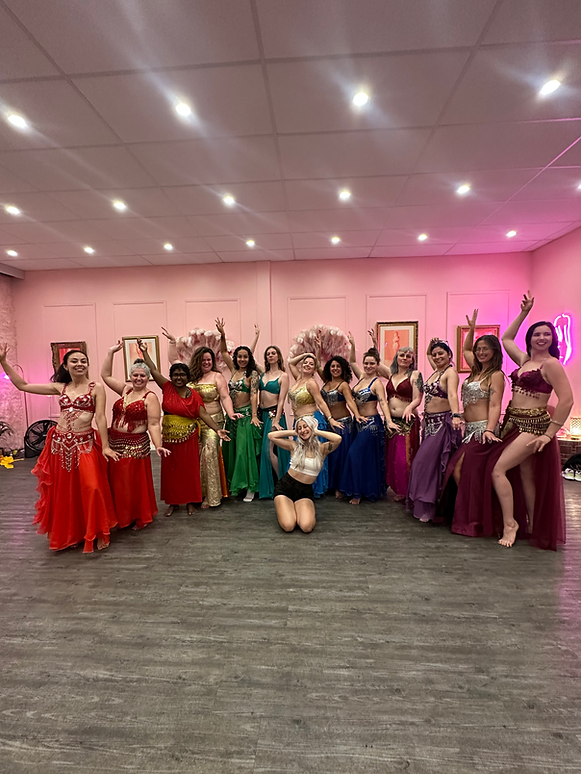 Joanna Belly Dance studio class Melbourne with students in bright costumes
