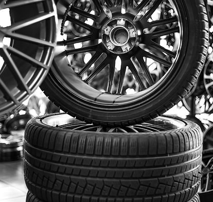 car-tires-with-rims-store-car-wheel-replacement-selective-focus.jpg