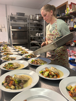 Family enjoying Alaska cuisine at our Alaska Fishing Lodge