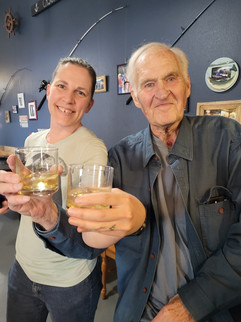 Guests enjoying beverage after fishing in Sitka, Alaska