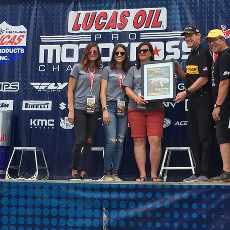 The family of Cody and Chris Gragg accept Legends and Heroes award on their behalf at Muddy Creek