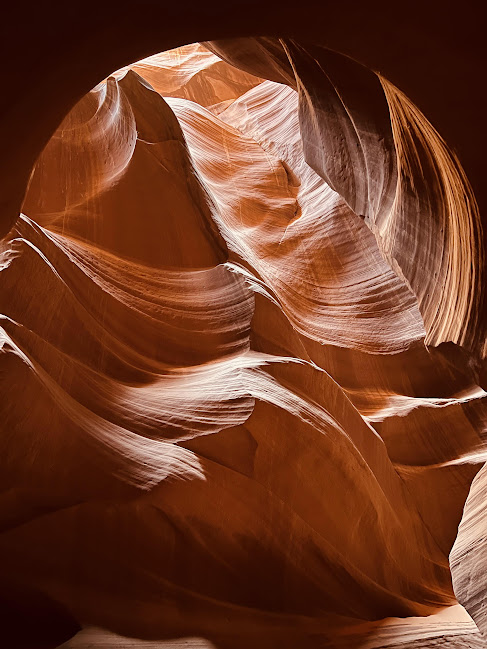swirly walls with half moon formation upper antelope canyon