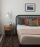 A bedroom design to showcase furniture and styling design services.