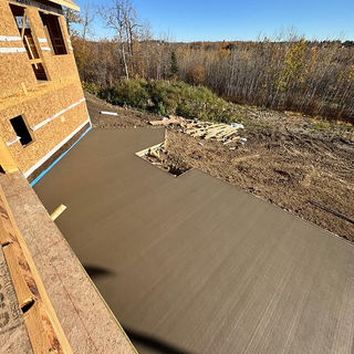 Broom finish sidewalk constructed with a consistent finish pattern, enhancing both safety and overall curb appeal.