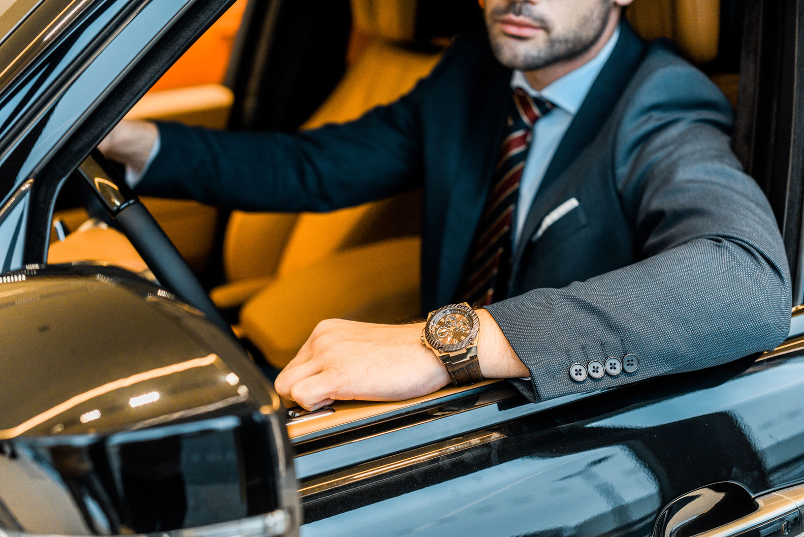 partial-view-of-businessman-with-luxury-watch-sitt-2021-08-30-01-46-04-utc.jpeg