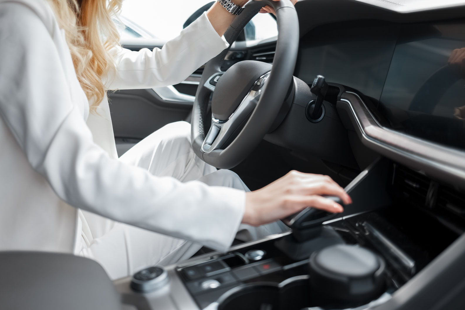 young-woman-driving-a-car-business-lady-driver-of-2022-01-20-16-05-34-utc.jpeg